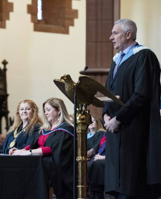 Principal giving speech Principal giving speech